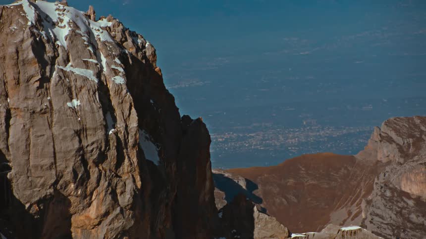 Aerial view of the snow covered peak of a mountain range
