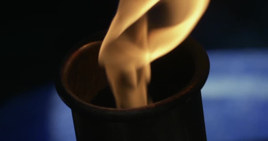 Manufacturing machine spraying fire