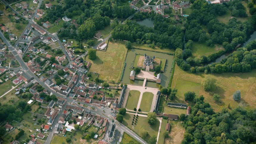 A suburb surrounded by trees and green vegetations