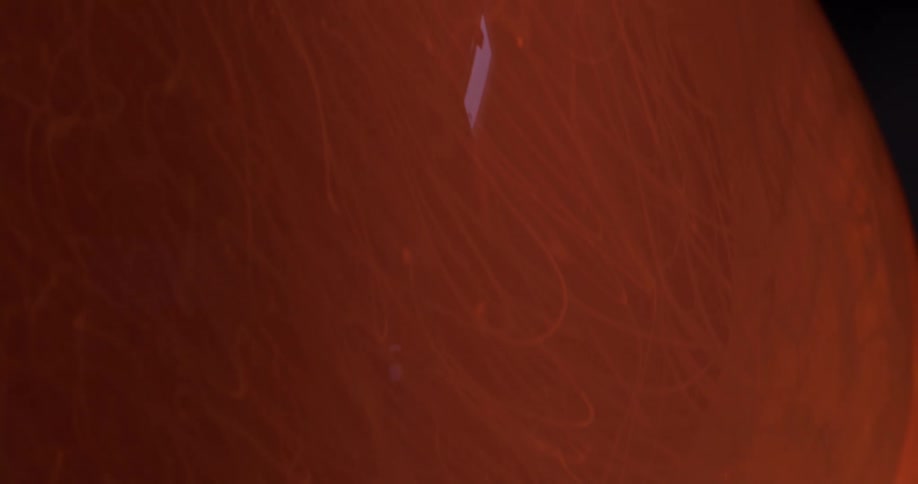 Closeup of a liquid glass vase in production