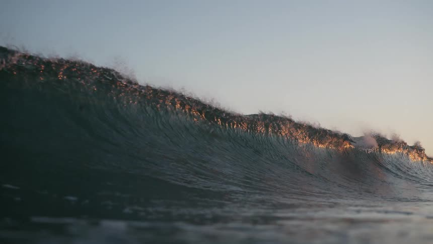 A view of a wave forming and breaking with force