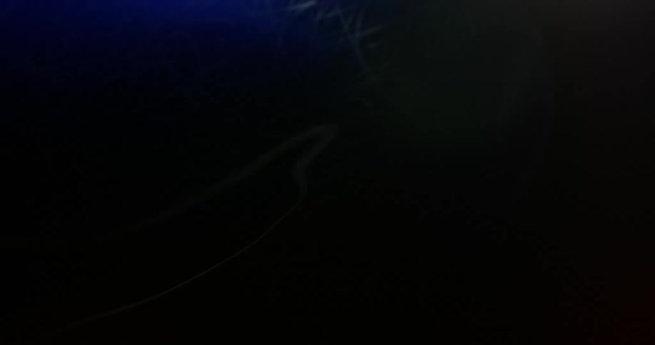 An abstract object with a texture of lines being illuminated and then turned off
