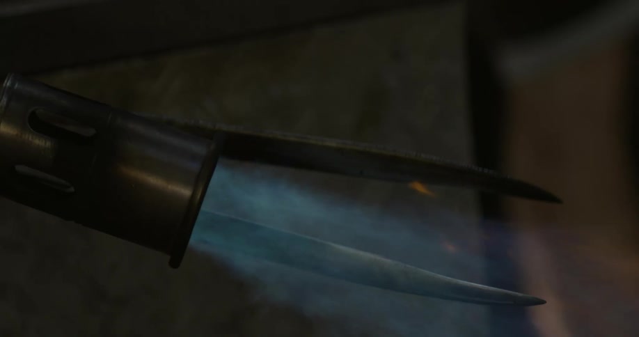 View of a jet of fire being launched onto a blade