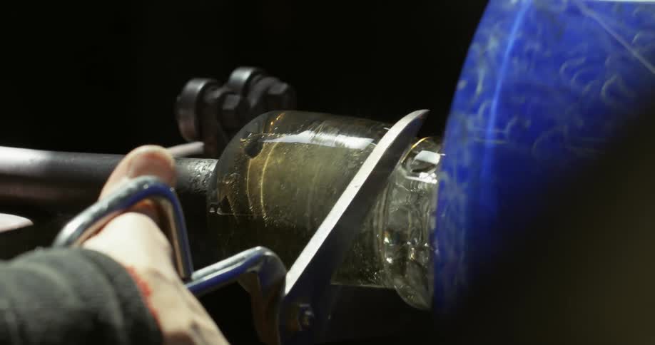 Molten glass on an iron bar