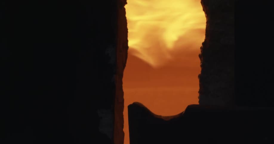 The visuals show flames by stone