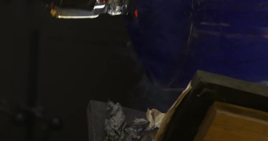 Production of a crystal glass vase with steam being expelled