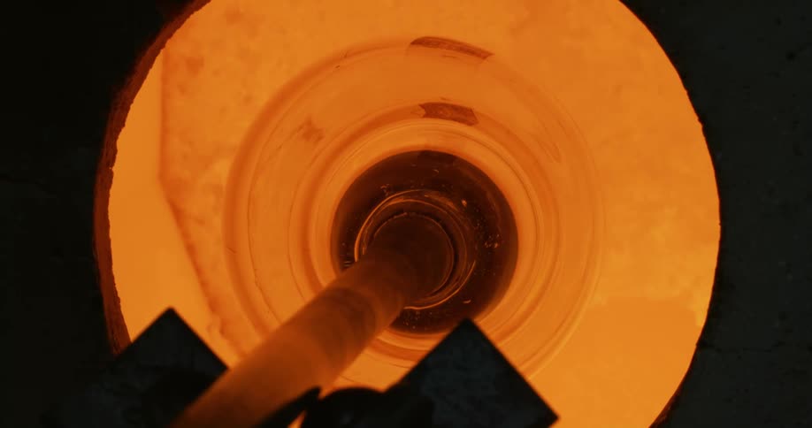 Mold with liquid crystal vase being removed from a heat machine