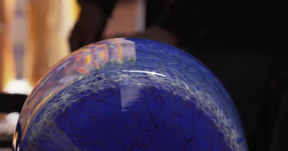 Blue ceramic vase being rotated and cooled