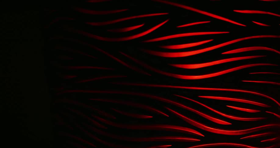 Several red lines of random shapes are being illuminated and then extinguished