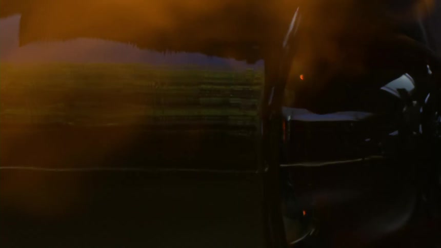 A glass object receiving several flames of fire