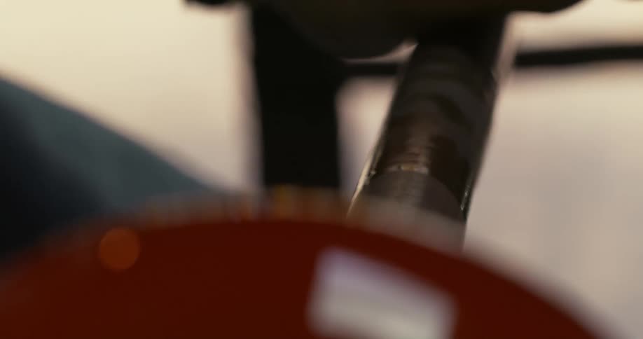 Closeup of a red glass sphere in the manufacturing process