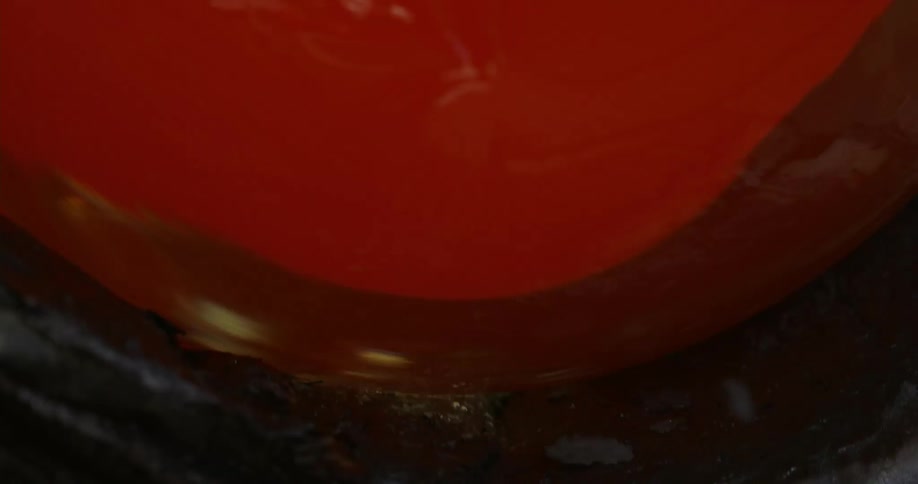 Piece of redhot glassware spinning