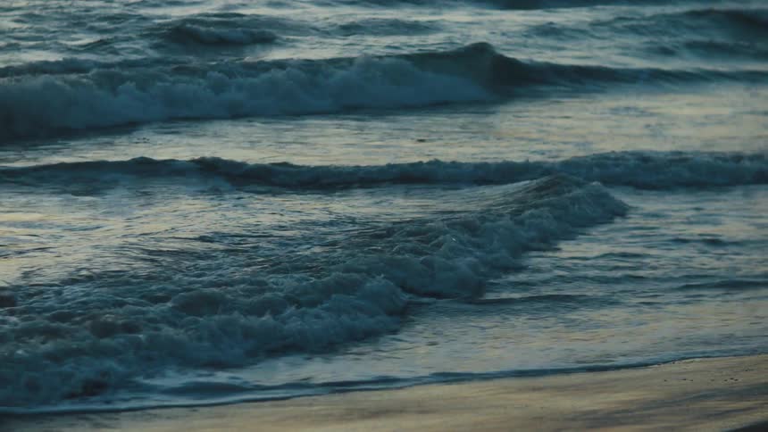 Waves crash on the beach