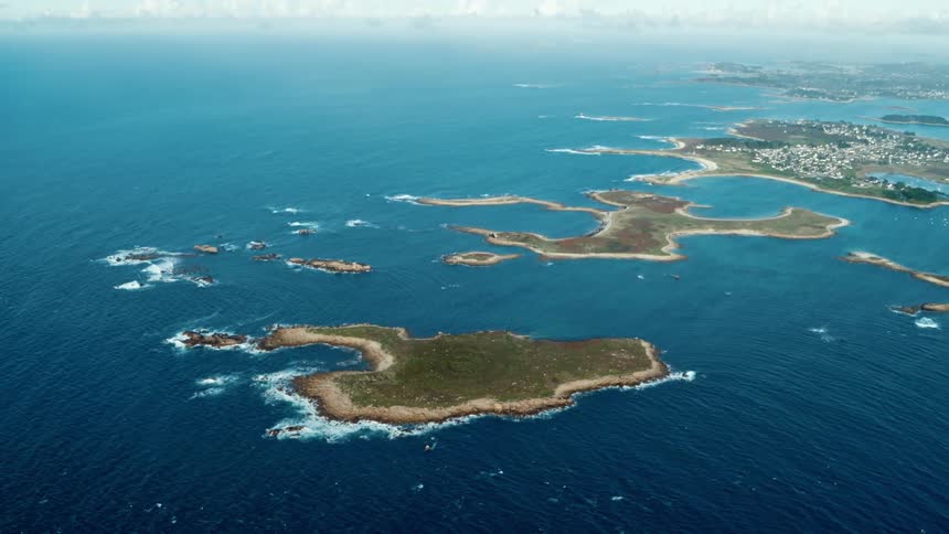 Aerial view of islands surrounded by the blue ocean