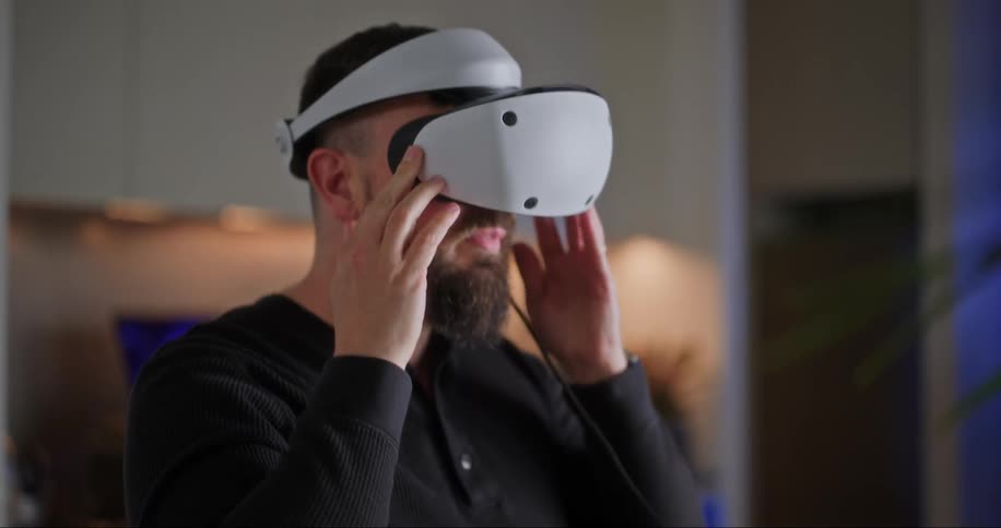 A man wearing virtual reality glasses