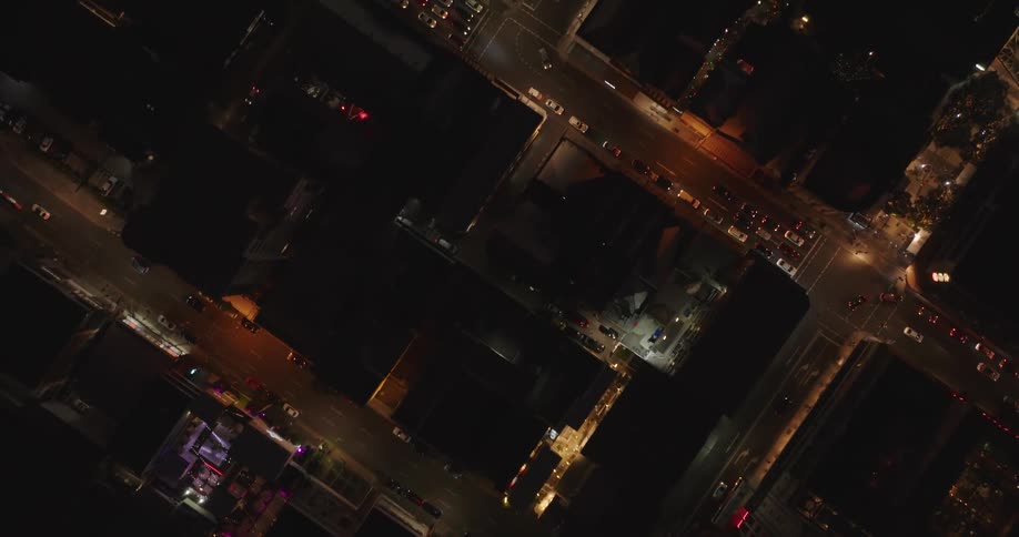 Traffic runs through the city at night