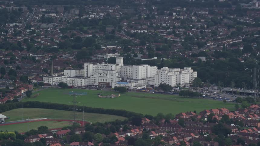 A large complex is in the middle of the suburbs
