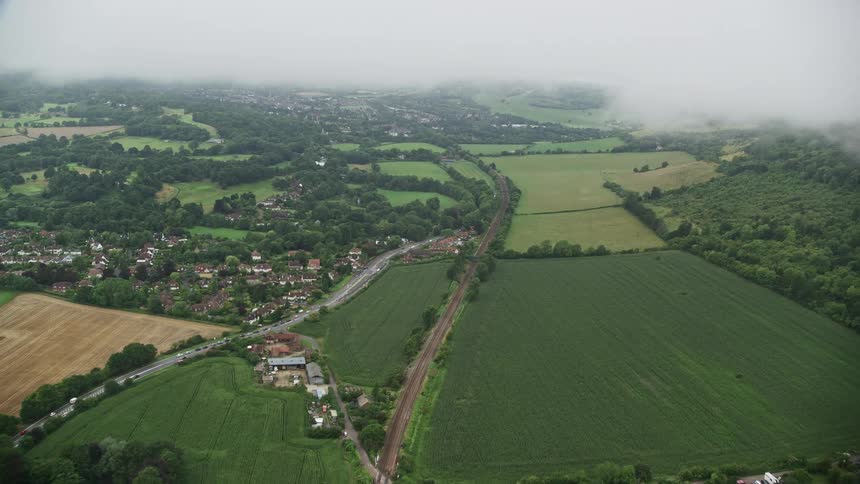 Aerial view of a rural area with roads and some dwellings