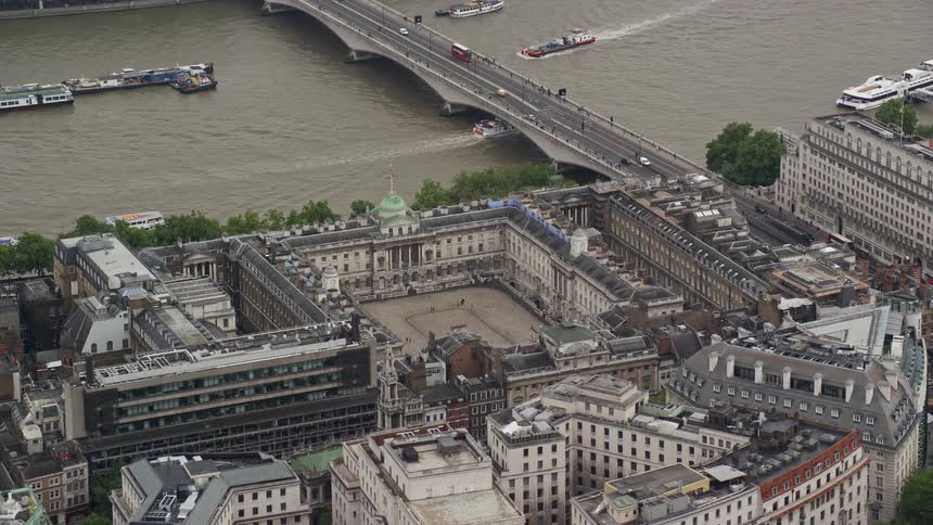Aerial view of a city with buildings by the seaside