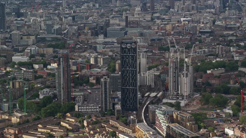 Metropolitan city skyline with glass towers during daytime