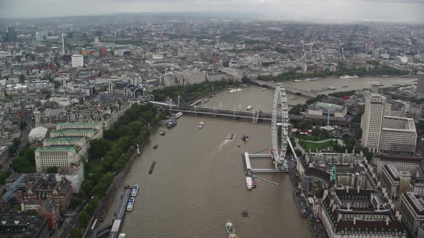 Boats travel down the river in the city