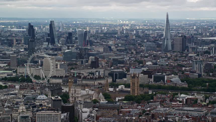 A city skyline view with lots of residential and high rise buildings including tower and skyscrapers