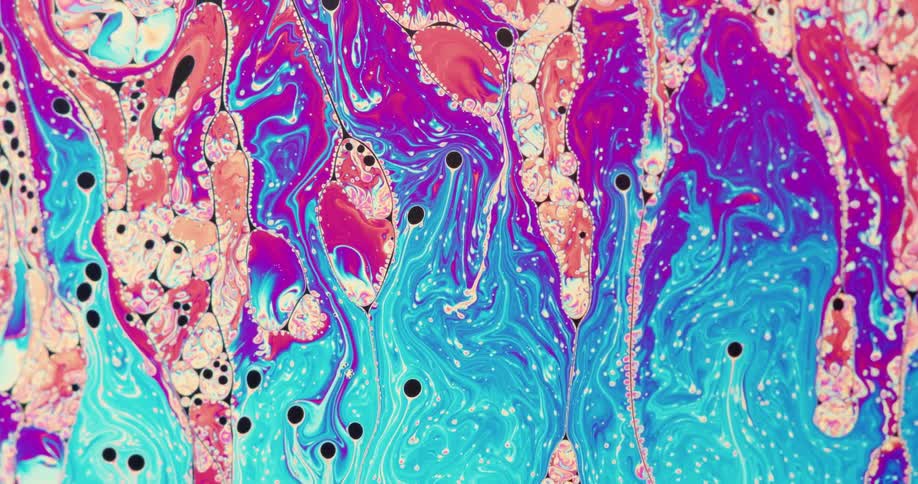 A psychedelic liquid with many distinct colors moving around