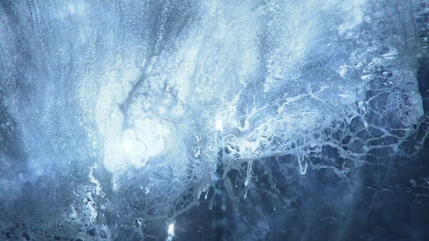Bright asteroids piecing through a texture of blue and white outer space elements