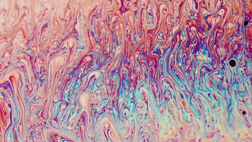 A colored liquid moving in different directions