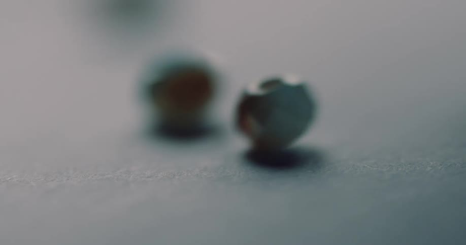 Small stones dripping on a surface