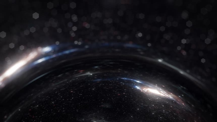 A reflective orb moves through the stars