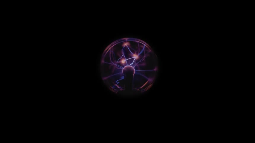 A tesla coil beaming energy in the dark