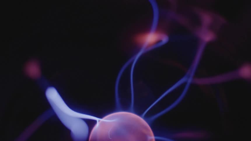 A sphere of electricity with purple lightning