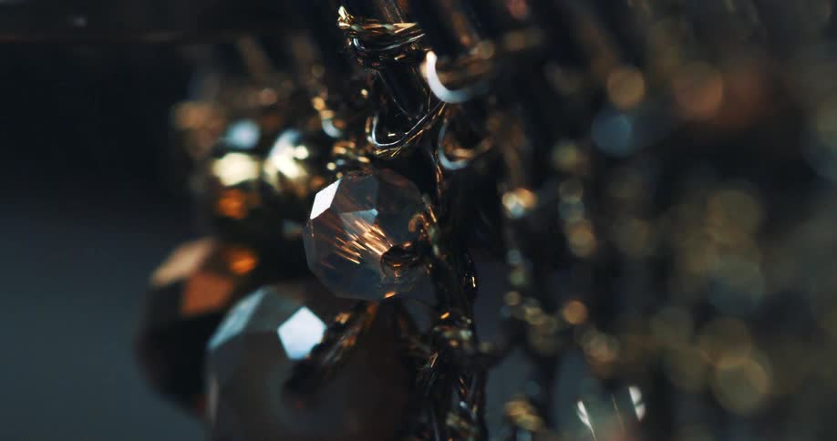 Closeup of jewelry with clustered gemstones