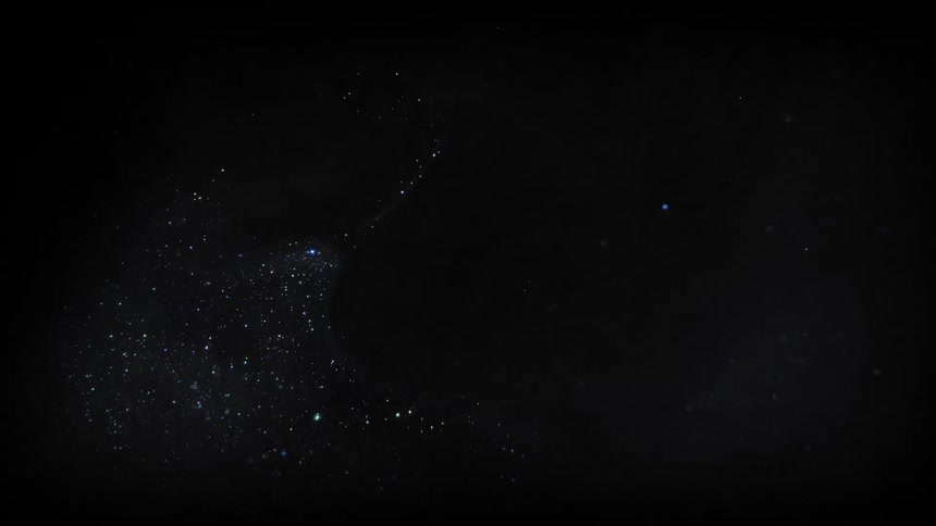 A glowing nebula with white lights in the galaxy