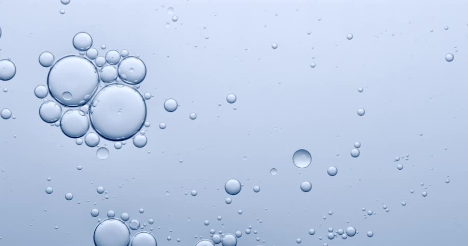 Bubbles floating in the clear liquid