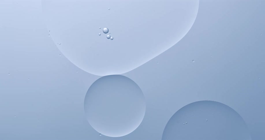 Large air bubbles float over a teal pastel background