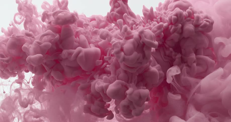 Bright colorful liquid ink flows forming abstract shapes