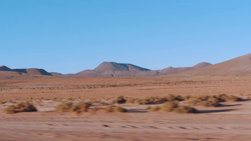 In the desert there are hills and dry sand as there is strong movement to the left