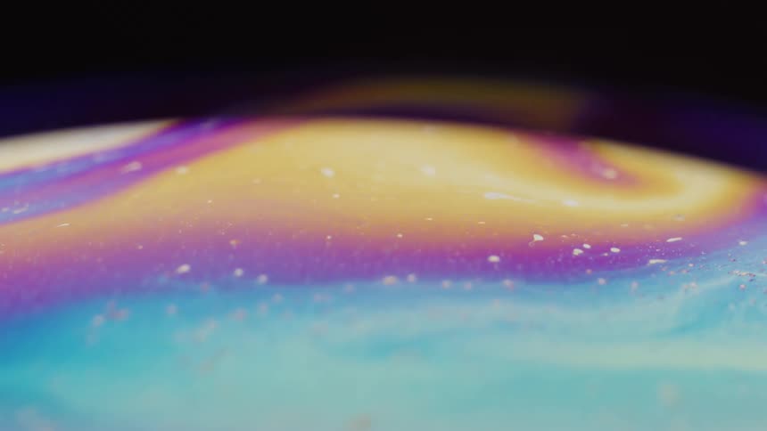 A clip of moving oil paint colors