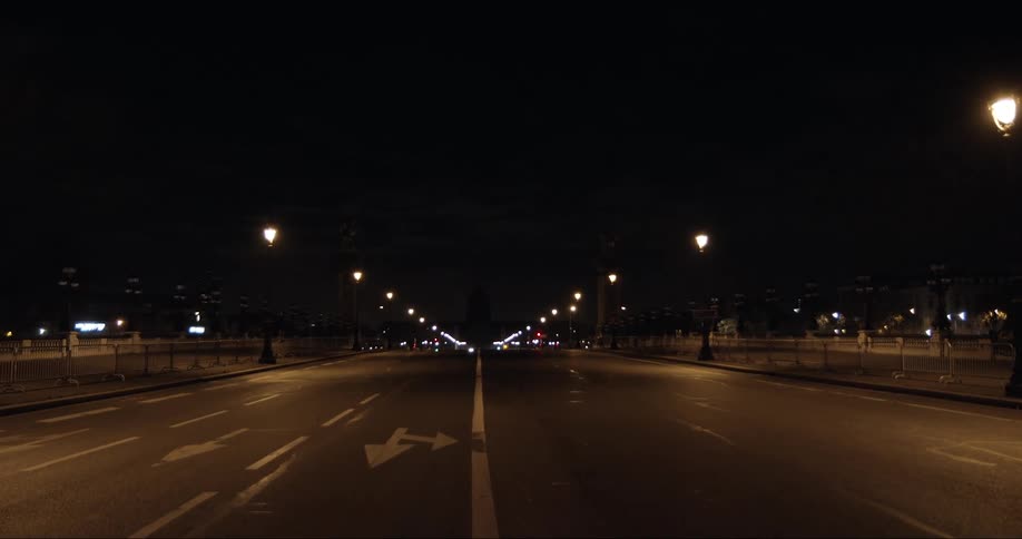 An empty highway in the city at night