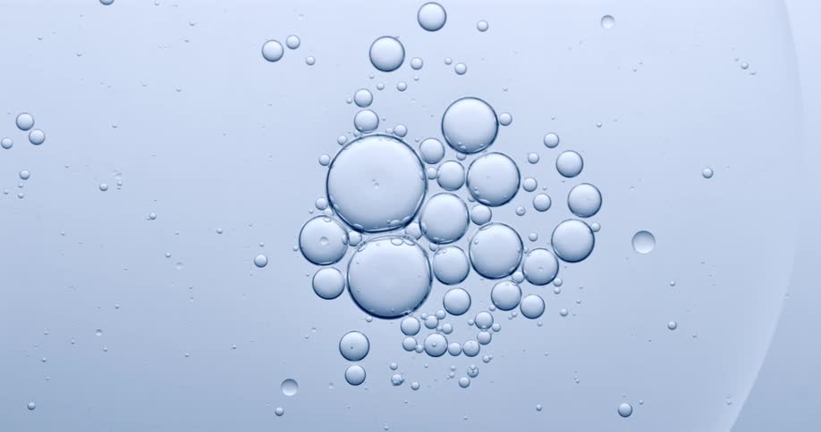 Large air bubbles float over a teal pastel background