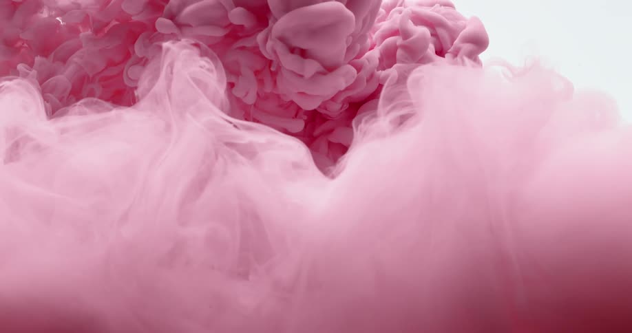 A pink paint flowing inside a water with a white background