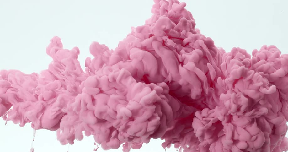 A pink color dissolve under water with a white background
