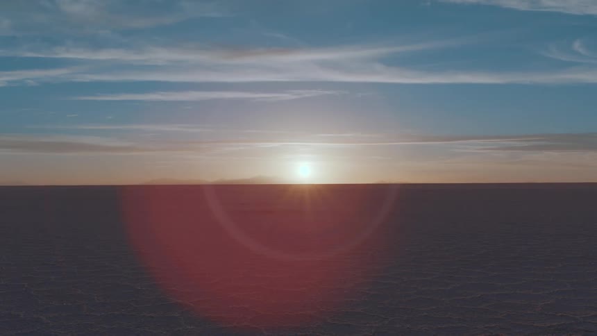 The sun is rising on the landscape