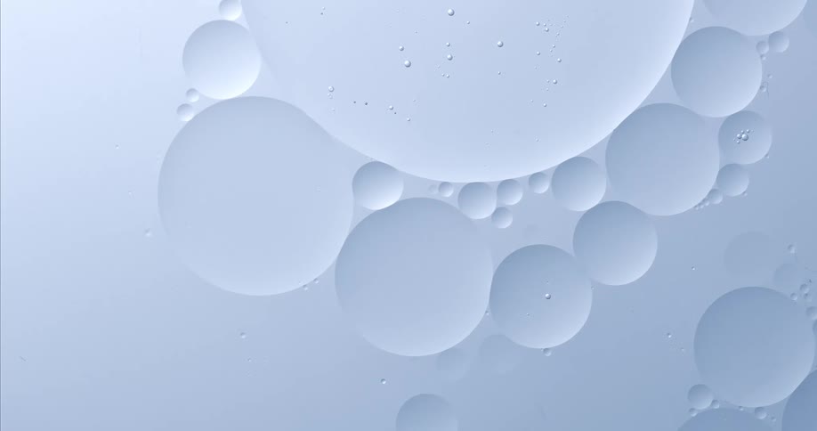 A group of different size bubbles are slowly moving upward