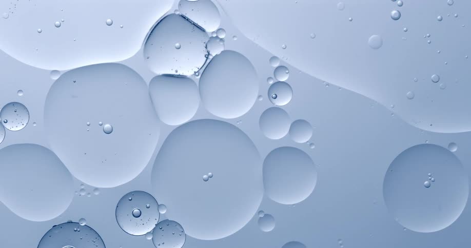 Varioussized bubbles effortlessly drift through a clear liquid