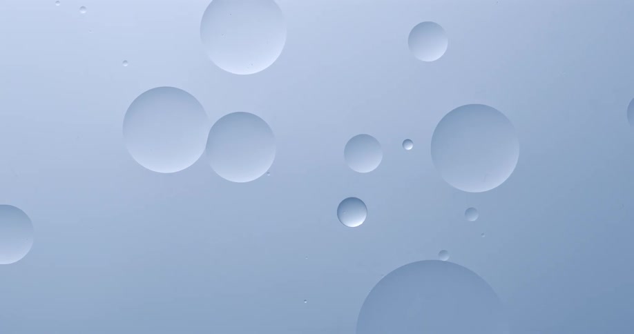 Varioussized bubbles effortlessly drift through a clear liquid