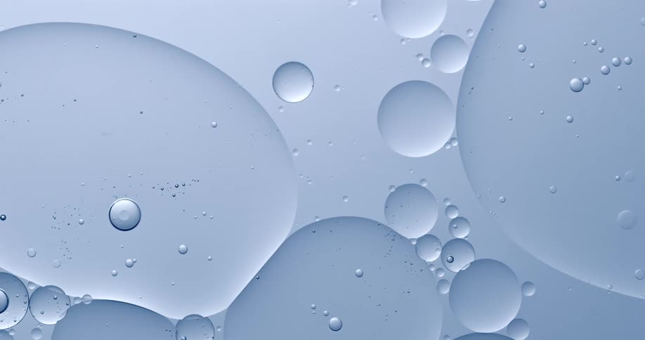Large air bubbles float over a teal pastel background