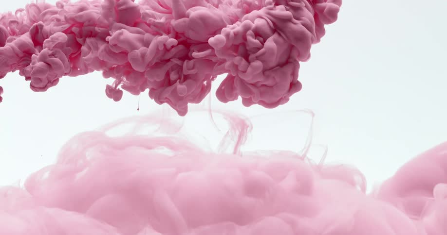 Mass of pink spreads into clear fluid and expands